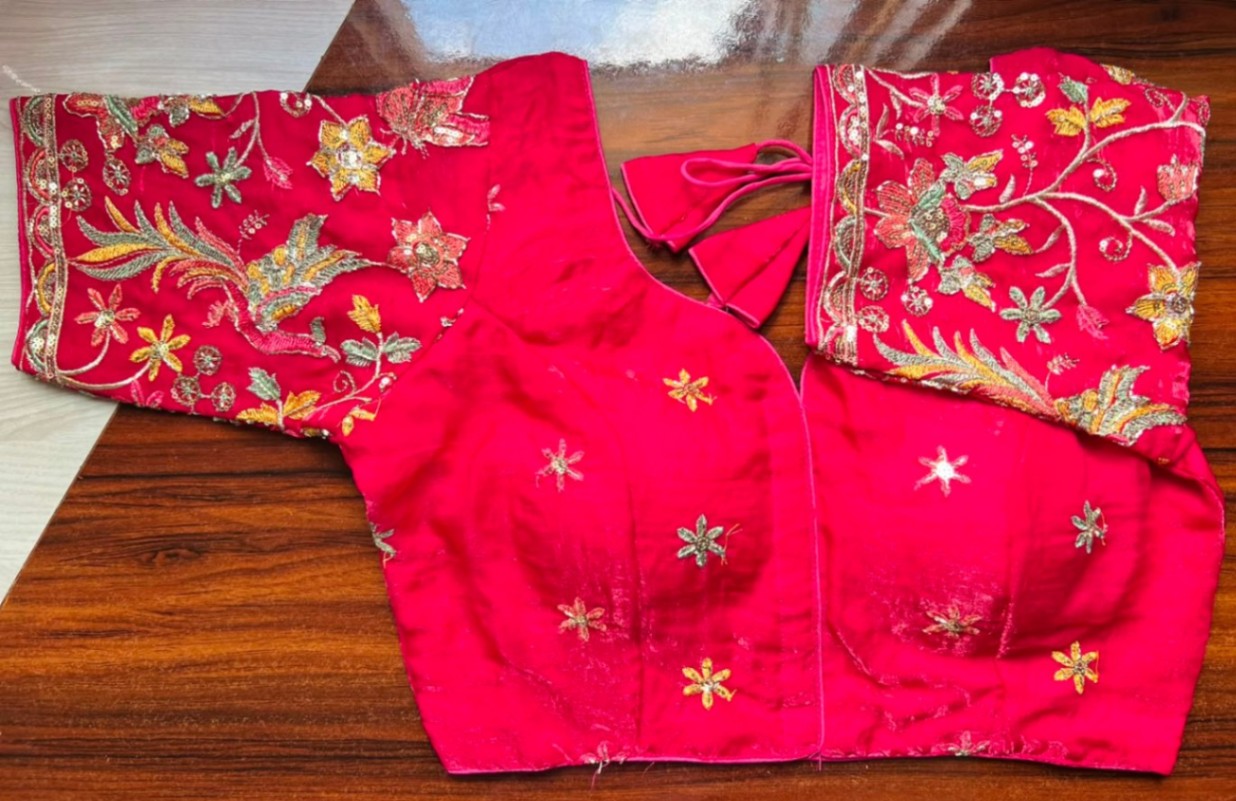 Silk Embroidery Blouse with elegant embroidery for festive saree wear.
