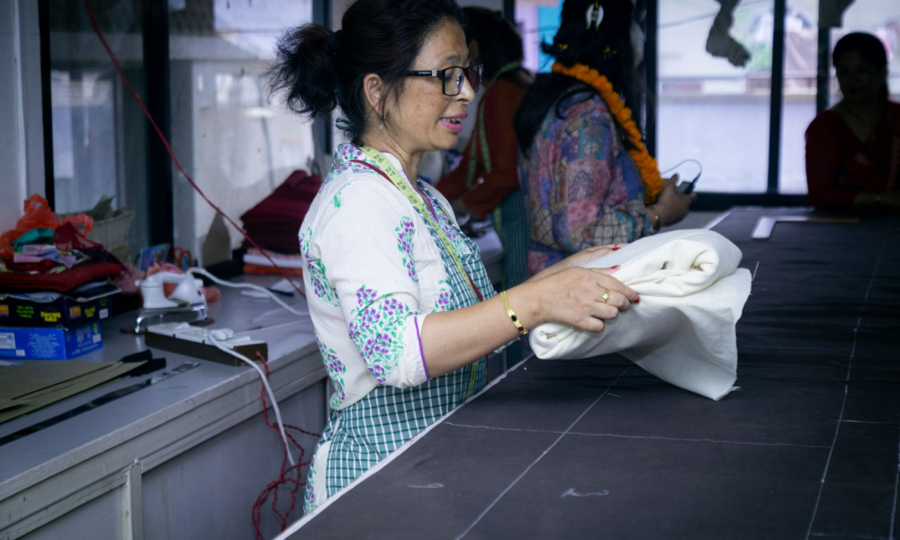 Home based women worker creating handmade products
